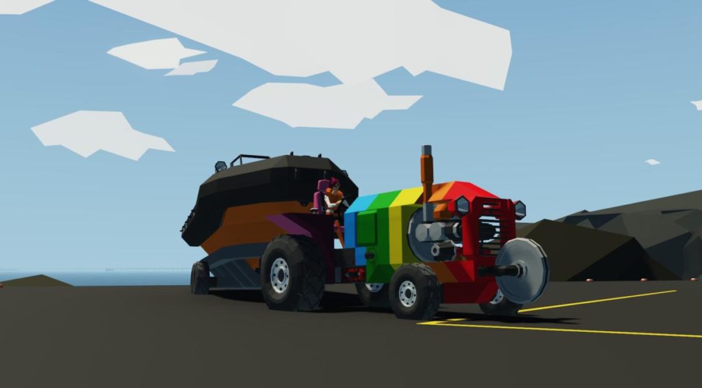 Rainbow tractor towing a boat on a road with a blue sky behind. 